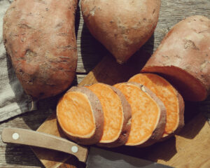 Sweet potato on the wooden table